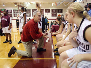  : Wildwood High School girls basketball coach Dave Troiano won his 600th career coaching victory in a win against Cape May County Technical High School. Troiano talks to his team during introductions. Tuesday Jan. 29, 2013. (Dale Gerhard/Press of Atlantic City)
 - Photo by Dale Gerhard