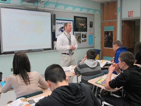 Oakcrest teacher of year Leathers also serves school as coach, adviser