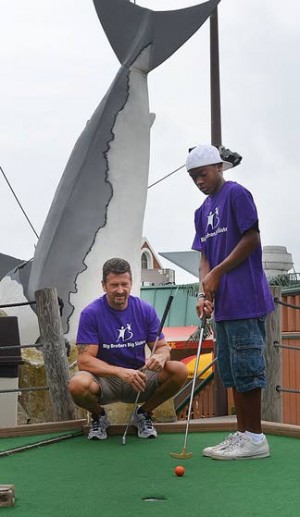 Teeing off to help kidsMini golf tournament benefits Big Brothers Big Sisters program