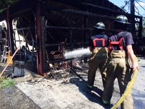 Mullica Firefighters contain garage fire, classic car lost