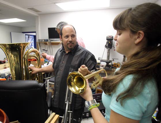 Hitting a helpful noteLinwood teens find new homes for unused instruments to help student musicians