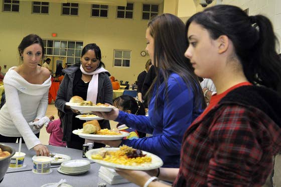 Three MTHS clubs join to stage dinner for Caring for Kids clients