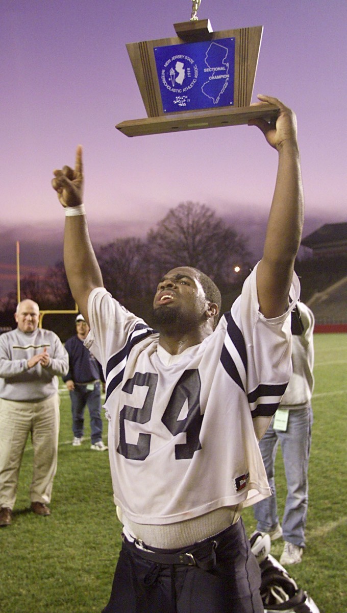 Jamar Reynolds with trophy 1999 Atlantic City football