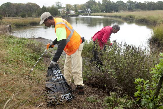 Absecon apartment residents clean up around nearby Route 9 fishing bridge