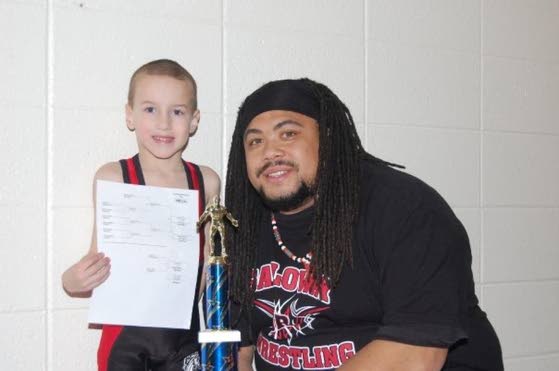 Friends plan fundraiser for wrestling coach who died at 31