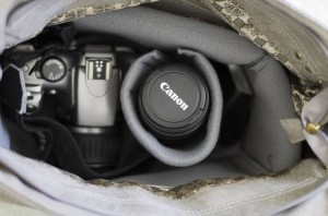 Handmade insert hides bulky camera in purse