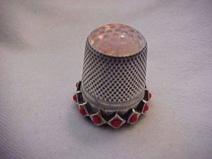 Antiques & Collectibles: Silver thimble is a flea market bonus