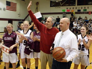  : Wildwood High School girls basketball coach Dave Troiano won his 600th career coaching victory in a win against Cape May County Technical High School. Troiano (center) thanks the fans and his assistant coaches and receives a game ball from principal Chris Armstrong. Tuesday Jan. 29, 2013. (Dale Gerhard/Press of Atlantic City)
 - Photo by Dale Gerhard