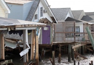  : Damaged homes on South Beach Ave on the Delaware Bay in Reeds Beach, Middle Township. Residents of Cape May County deal with the clean-up in the wake of Hurricane Sandy. Wednesday Oct. 31, 2012. (Dale Gerhard/Press of Atlantic City)
 - Photo by Dale Gerhard