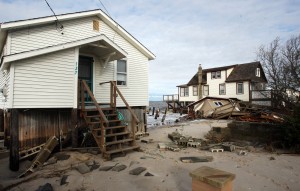  : Damaged homes on North Beach Ave on the Delaware Bay in Reeds Beach, Middle Township. Residents of Cape May County deal with the clean-up in the wake of Hurricane Sandy. Wednesday Oct. 31, 2012. (Dale Gerhard/Press of Atlantic City)
 - Photo by Dale Gerhard