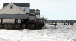  : Wave batter the bulkhead on a home at North Beach Ave on the Delaware Bay in Reeds Beach, Middle Township. Residents of Cape May County deal with the clean-up in the wake of Hurricane Sandy. Wednesday Oct. 31, 2012. (Dale Gerhard/Press of Atlantic City)
 - Photo by Dale Gerhard