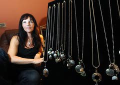 She's facing life's troubles with jewelry and ideas