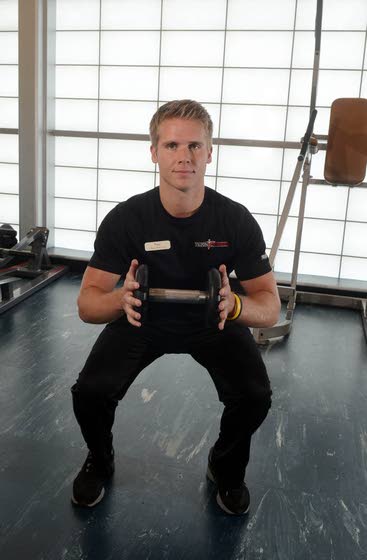 Your Workout: Squat with knee lift and torso rotation