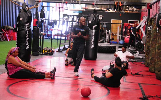 Trainer's fitness program focuses on caring for his clients' health