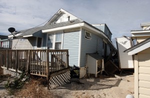  : Damaged homes on South Beach Ave on the Delaware Bay in Reeds Beach, Middle Township. Residents of Cape May County deal with the clean-up in the wake of Hurricane Sandy. Wednesday Oct. 31, 2012. (Dale Gerhard/Press of Atlantic City)
 - Photo by Dale Gerhard