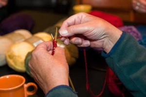Scarf It Up pairs friendly get-together with program of knitting for charity