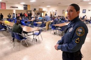 Increasing Patrols: Hamilton Township Police officer, Nicole Nelson, of Mays Landing, in the cafeteria during a lunch period at Oakcrest High School, in Mays Landing. In the wake of last months Newtown, Conn. school massacre the township has stepped up patrols and is working with schools and other public facilities to ensure safety. Thursday, January, 17, 2013( Press of Atlantic City/ Danny Drake)
 - Photo by Danny Drake