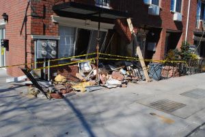 Driver crashes van into office building