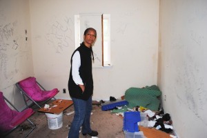 Cancer survivor has to live next to gang house 1