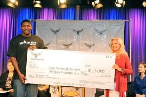 Queens NBA star helps kids at home 1