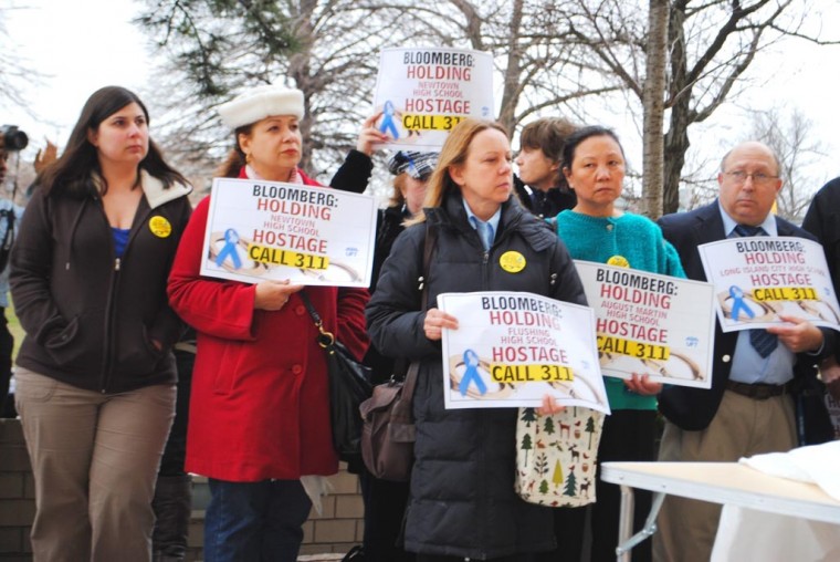 Parents, pols protest plan to close schools 1