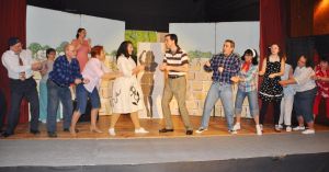 Romance and a paycheck set to music 1