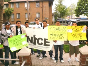 Workers rally for back wages, damages  1