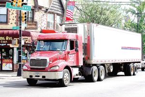 <p>An 18-wheeler on Flushing Avenue. COMET and elected officials are looking for more consistent and harsher enforcement for truck route violations. The DOT still doesn’t explicitly label the Maspeth Bypass on its website maps.</p>
