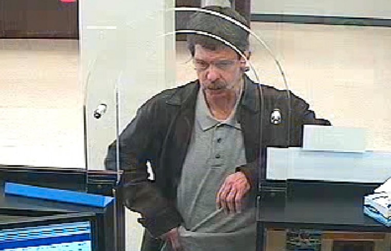 Charged in bank job  1