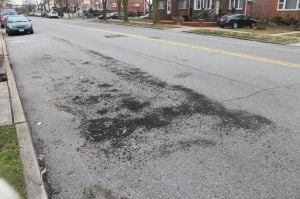 Pothole patch job irks Ozone Pk block 1