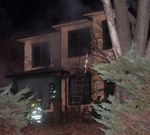 Century-old Rock Island home damaged in fire