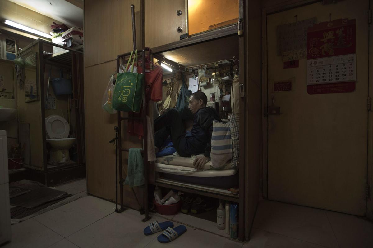 APTOPIX Hong Kong Cubicle Homes