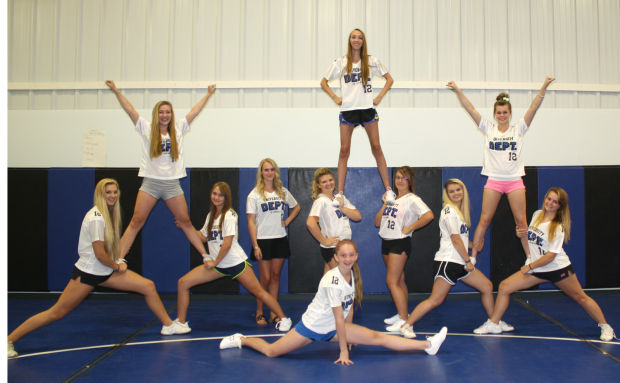 Cheer and Dance team breaks new ground : Community