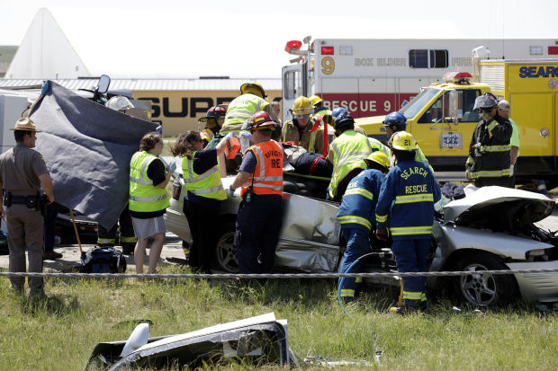 Interstate 90 wreck slows traffic, two injured