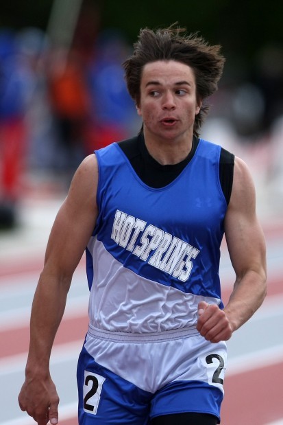 Hot Springs' Shane Hansen competes in the 200meter dash during the Black