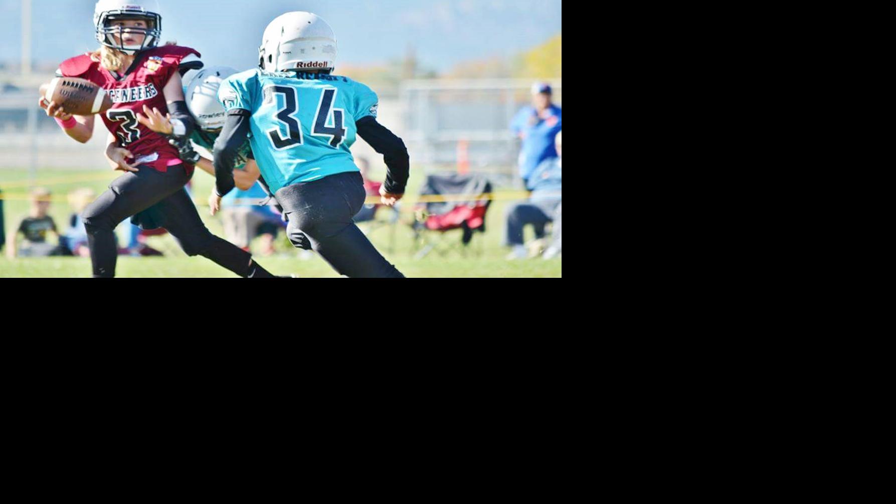 Throw like a girl Youth football quarterback leads her team to the