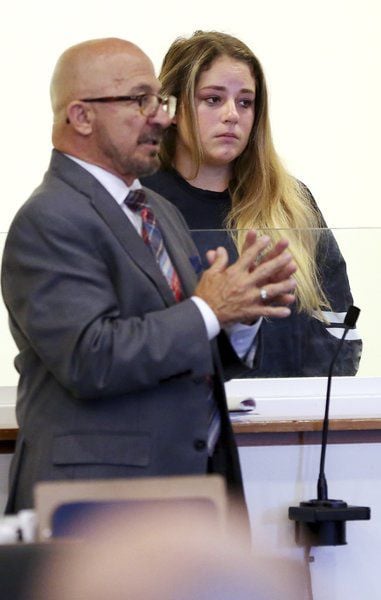 Police say woman bit off part of officer's ear