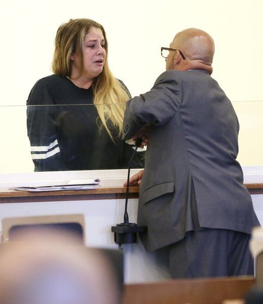 Police say woman bit off part of officer's ear