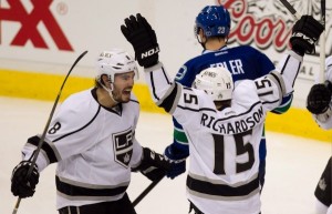 Kings knock out Canucks in OT