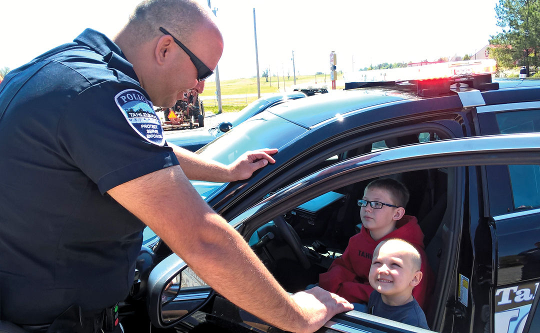Youngsters interact with protectors at Hero Rally