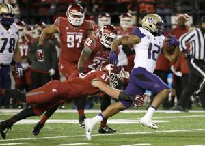 Huskies cruise past Cougars in Apple Cup