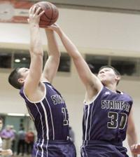 Stamford boys ride big three, foul shots past Delhi