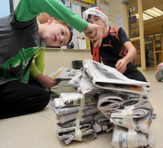 Wood School students make tables out of newspapers Schools