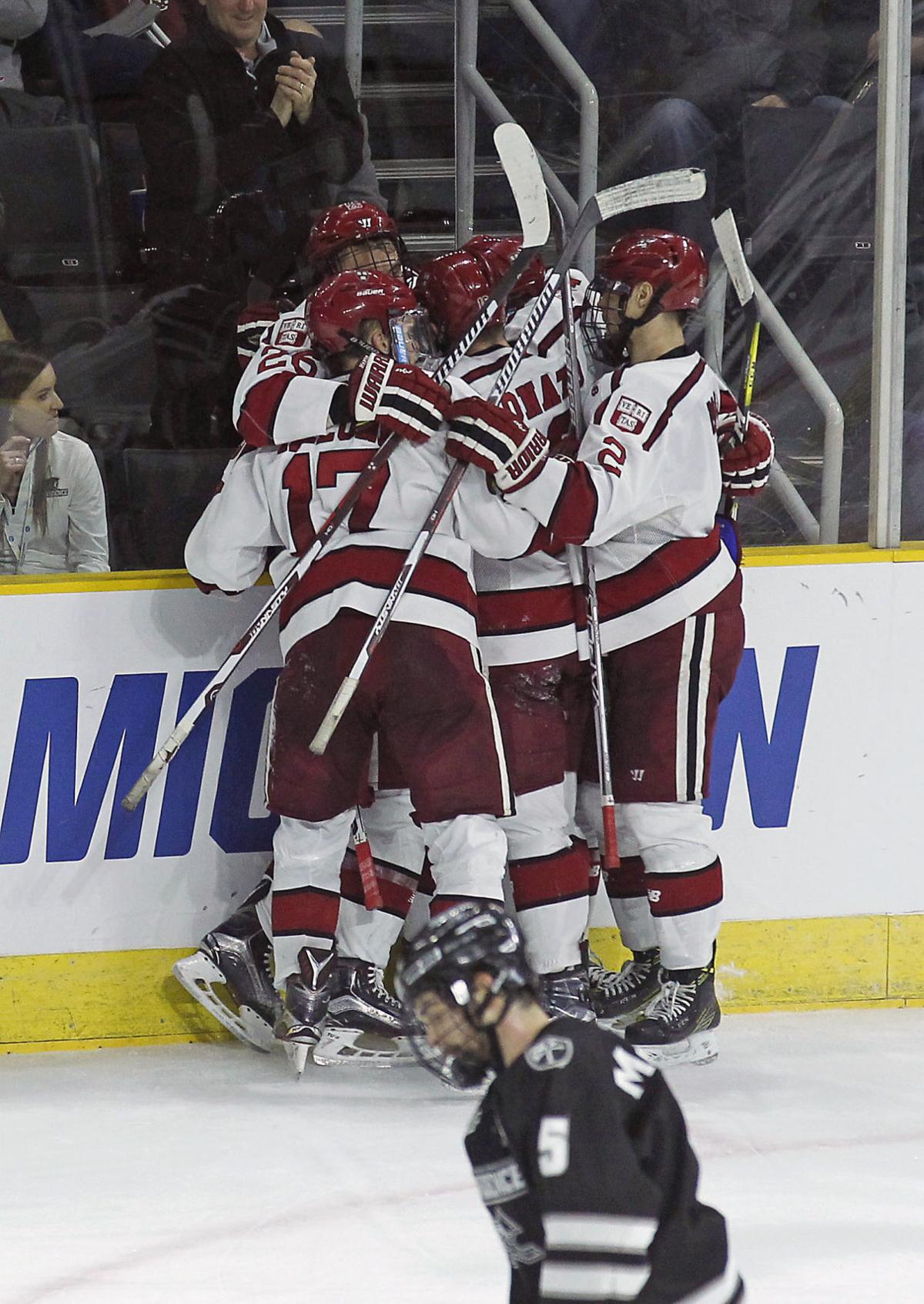 COLLEGE HOCKEY Harvard blanks PC in East Regional semifinal Local