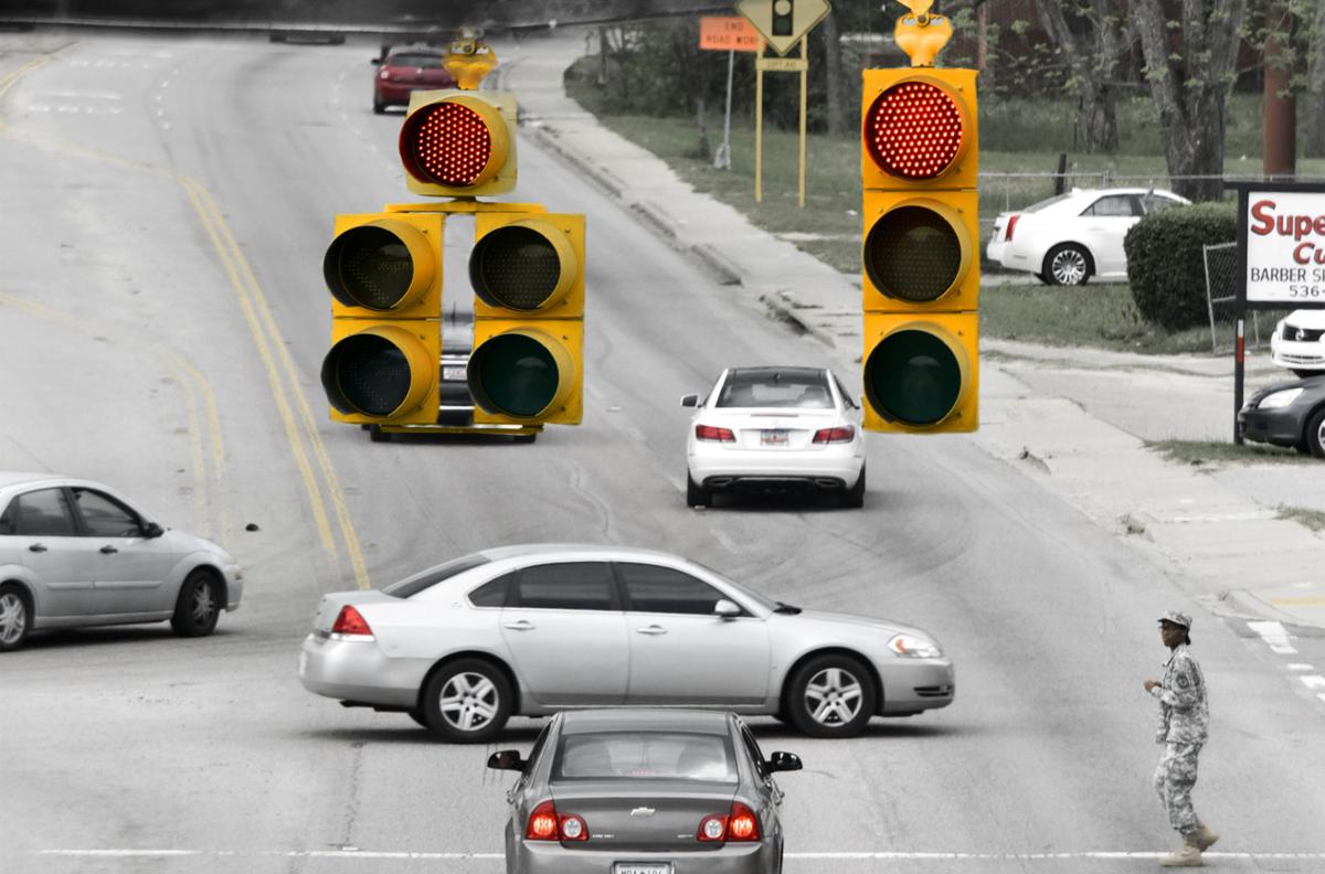 RED MEANS STOP City cracking down on running traffic lights News