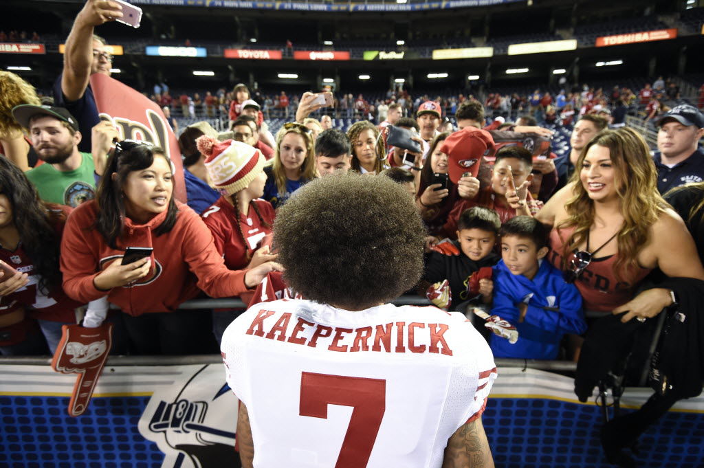 Jim Harbaugh wrote Colin Kaepernick's 'Time 100' bio and praised the QB's  protest 