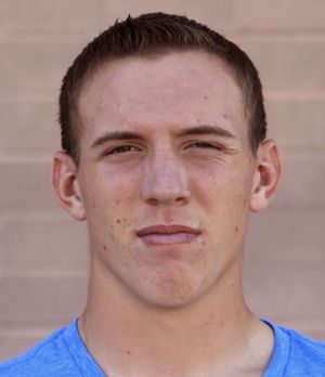 Marana&#39;s Travis Howard is 47-0 heading into the Division I 220-pound state championship bout. - 54d400b7f18db.preview-300