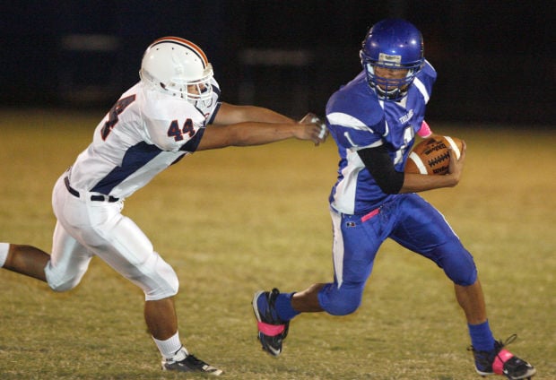 10. Darrian McIver (with ball), QB/DB, 2011