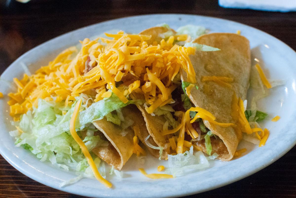 Taco No. 96 Beef patty tacos are Tucson in a tortilla Tucson