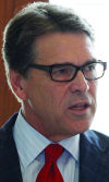 Perry says he has experience, record to back up his rhetoric